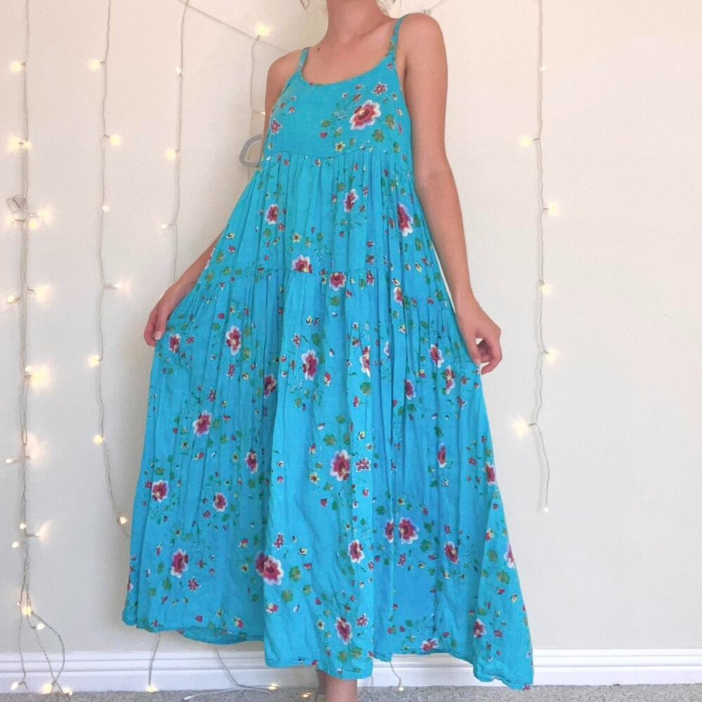 Bright blue tiered tank dress with pink and white floral pattern